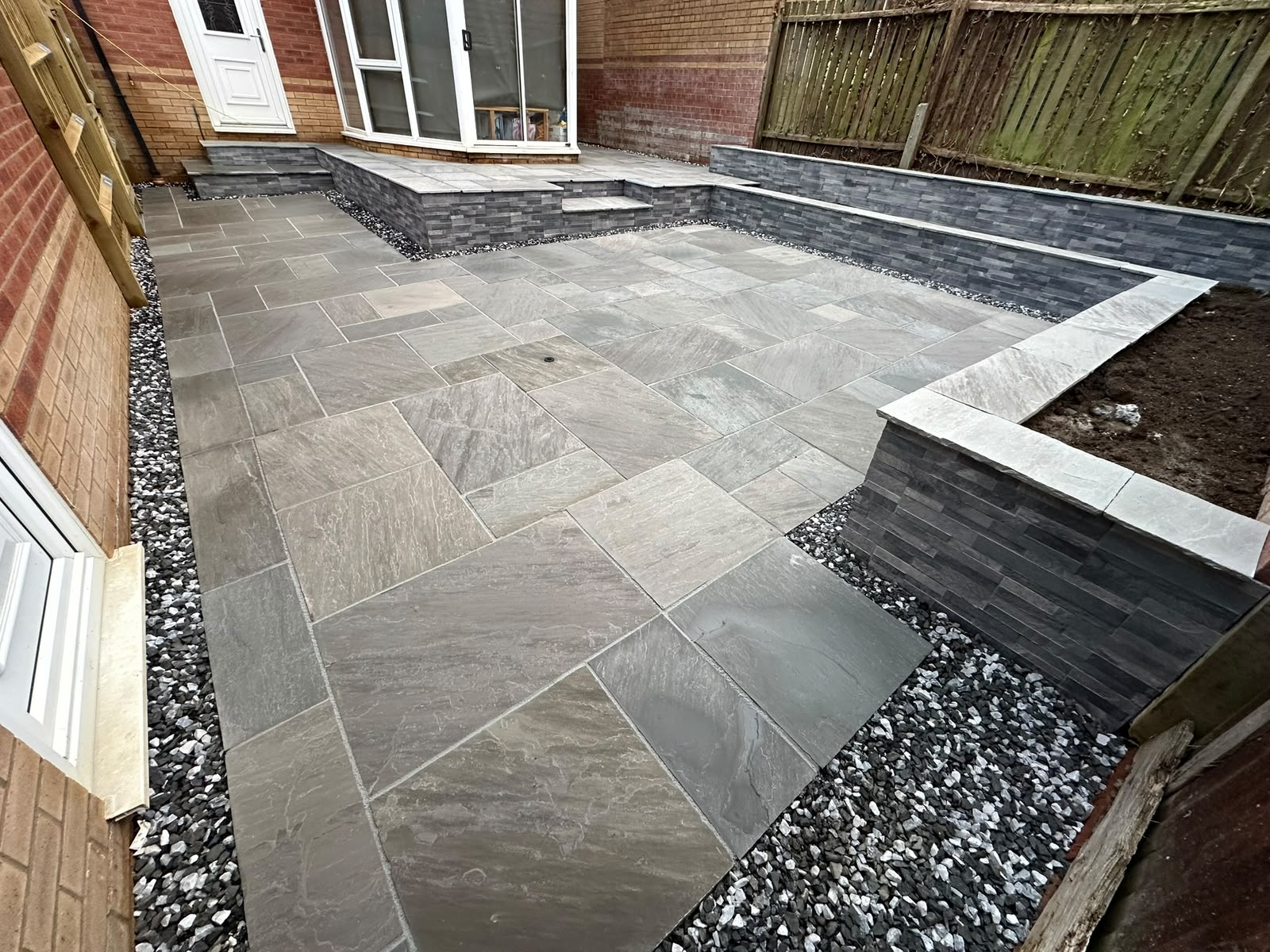 Modern porcelain patio completed by King Landscapes