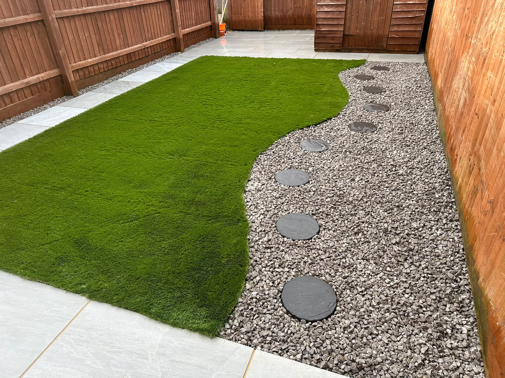 Large patio and landscaped garden completed by King Landscapes